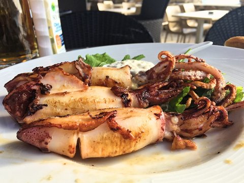 plate of fresh whole calamari