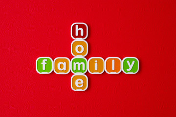 FAMILY, HOME word block on RED background. 