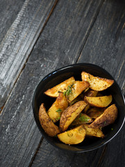 Country potatoes with dill and spices copy space