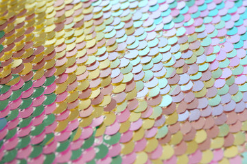 Bright iridescent sequins, closeup