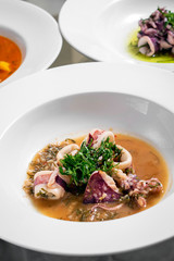 mediterranean squid stewed in garlic and wine sauce seafood tapas
