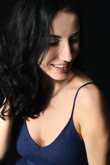 Naklejka premium Portrait of beautiful woman on dark background