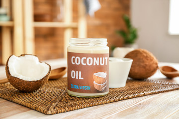 Jar of coconut oil on table in kitchen