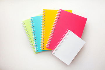 notebooks multicolored white background