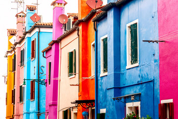 Fototapeta na wymiar Beautiful vibrant colorful houses in Burano near Venice in Italy.