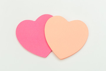  colour  paper heart stick note on a white background