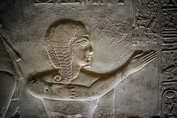 Detail of the relief, drawing with hieroglyphs based on the mythology of ancient Egypt - Temple of...