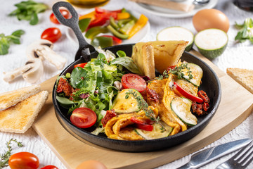 Omelet served with salad