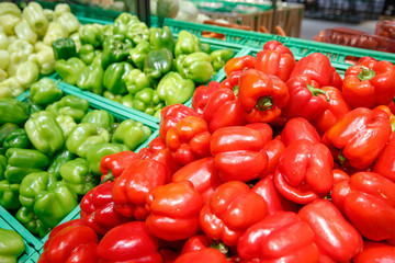 Unpacked, fresh peppers in a self-service supermarket.