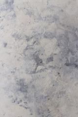 gray concrete background. wall with stained gray paint strokes