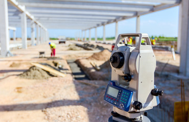 Geodesist device on tripod on a building site