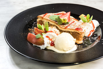 Sweet dessert, apple pie served on plate