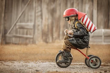 Foto op Canvas Boy play in the rider and the rocketman © Alexandr Vasilyev