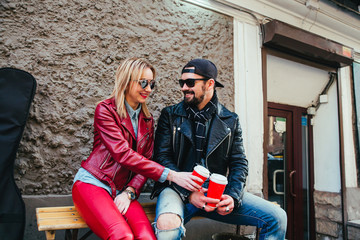 Plakat Couple in love drinking coffee in strret coffee shop