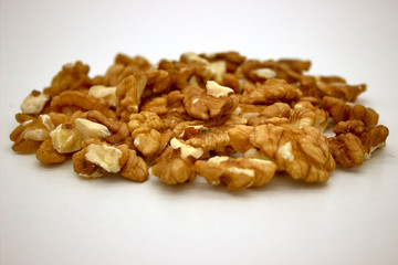 Walnut Kernels (Other Names: Juglans Regia, Persian Walnut, English Walnut, Circassian Walnut). Isolated Image On A White Background