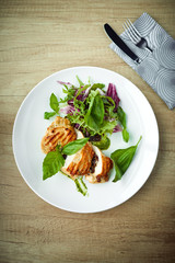 grilled chicken breast and salad