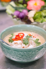 Soya bean dipping sauce with crab in coconut milk
