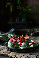sweet pea  and avocado deviled eggs.style rustic.