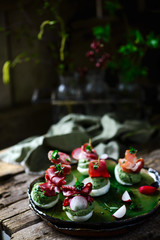 sweet pea  and avocado deviled eggs.style rustic.