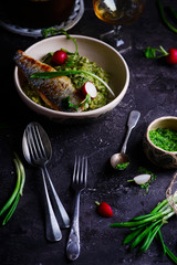 risotto with wild garlic and sea bass.style rustic.