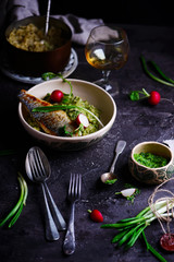 risotto with wild garlic and sea bass.style rustic.