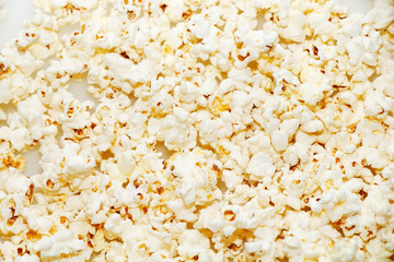 Hot cooked popcorn on a white background