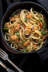 Lunch table - spaghetti with mussels. Top view, flat lay
