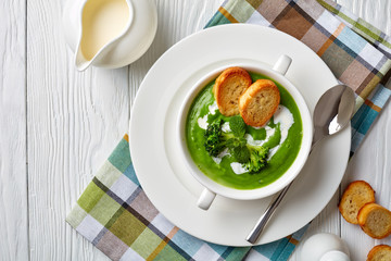 broccoli cream soup in a white bowl
