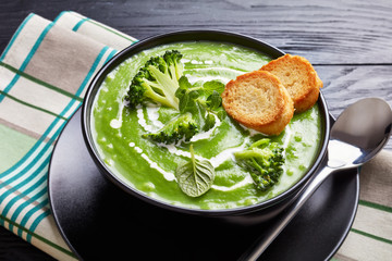 broccoli cream soup with fresh mint, close-up