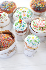 Easter cakes on a white wooden background