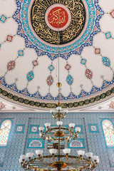 Obraz na płótnie Canvas the mosque from inside. interior. chandelier, pattern, tile