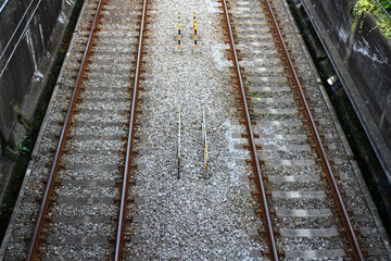 Fototapeta na wymiar Close up of train tracks lined up straight