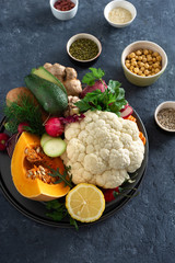 Ingredients cooking vegetarian Indian dish aloo gobi top view Healthy food