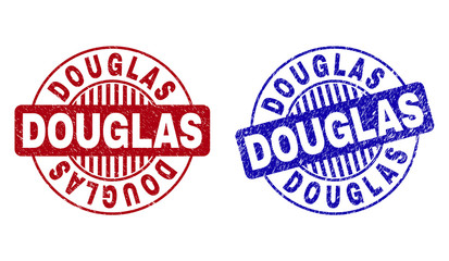Grunge DOUGLAS round stamp seals isolated on a white background. Round seals with grunge texture in red and blue colors. Vector rubber watermark of DOUGLAS label inside circle form with stripes.