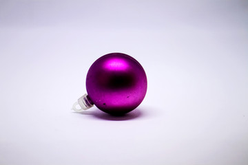 Christmas decoration, purple ball on a white background