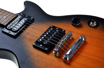 detail of electric guitar on an isolated white background