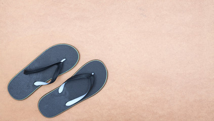 Flip-flops on soft background. concept of vacation and holiday