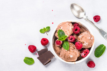 Chocolate ice cream with raspberries.