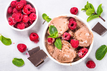 Chocolate ice cream with raspberries.
