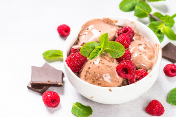 Chocolate ice cream with raspberries.
