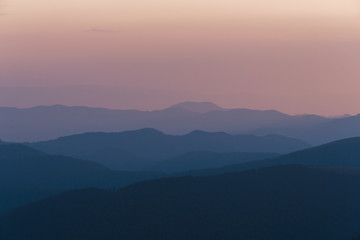 Fototapeta na wymiar evening mountains silhouettes