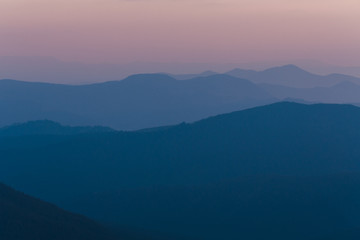 Obraz premium evening mountains silhouettes