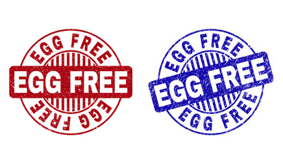 Grunge EGG FREE round stamp seals isolated on a white background. Round seals with grunge texture in red and blue colors. Vector rubber imitation of EGG FREE caption inside circle form with stripes.