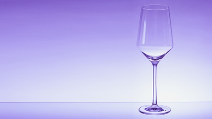 glass of white wine with wave on white background