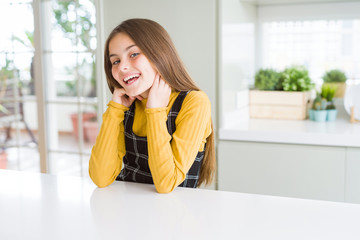 Beautiful young girl kid smiling confident and excited to the camera