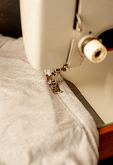 Background type of sewing machine, tailoring process. sewing workshop.