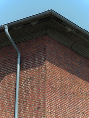 view to the top of a brick building