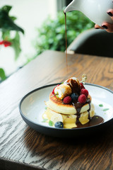 Pancakes with berries and marshmallow