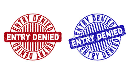Grunge ENTRY DENIED round stamp seals isolated on a white background. Round seals with grunge texture in red and blue colors.