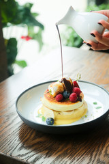 Pancakes with berries and marshmallow